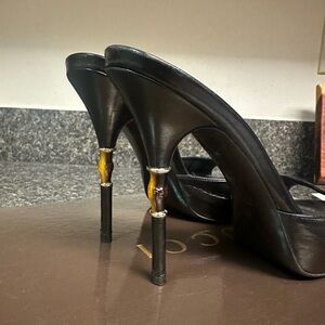 Gucci Black and Gold High Heeled Pumps